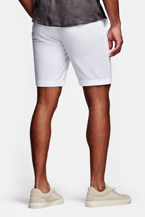all white organic cotton men's shorts with a zip pocket | MR MARVIS