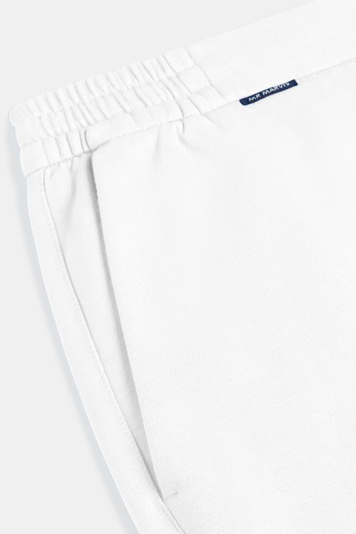 all white stretch knitted men's trousers | MR MARVIS