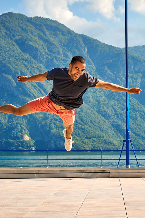 bright coral stretch cotton men's shorts with a zip pocket | MR MARVIS